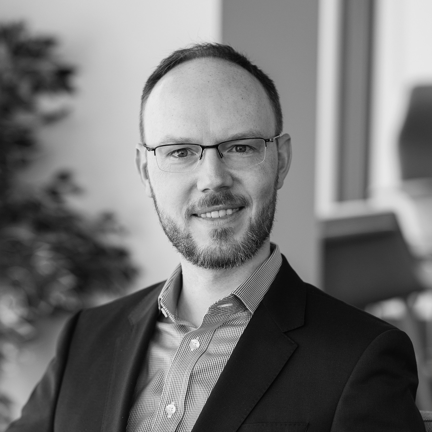 Black and white formal headshot of David Jolly.