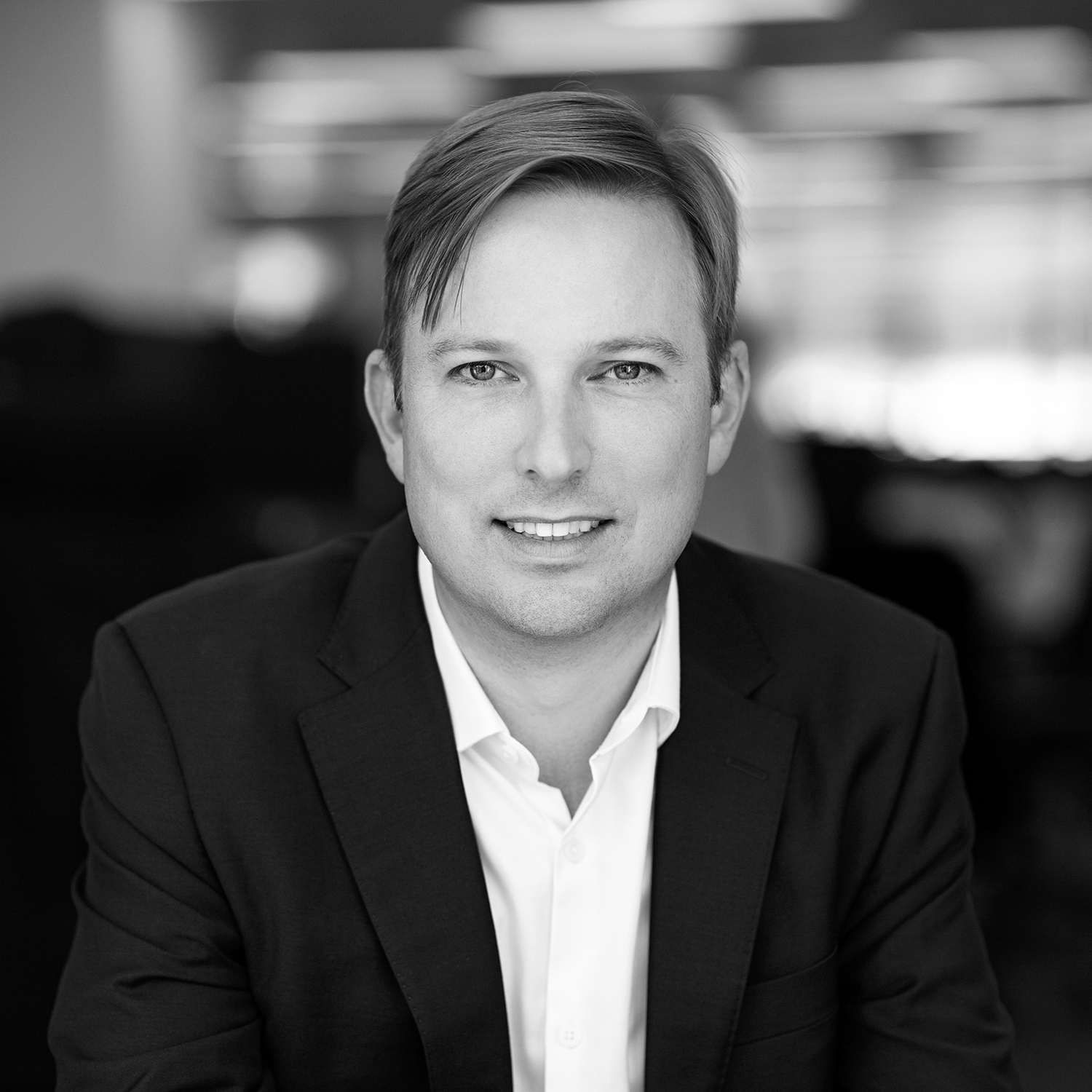 Black and white formal headshot of Steven Stolk